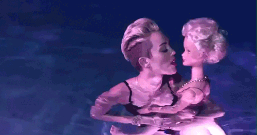 miley cyrus bathing suit swimming pool kissing doll sexually barbie gif
