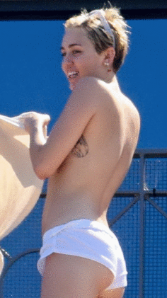 miley cyrus breast slip exposed while changing clothes hotel balcony not shy